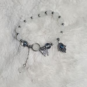 Elegant White and Silver Beaded Bracelet with Charms